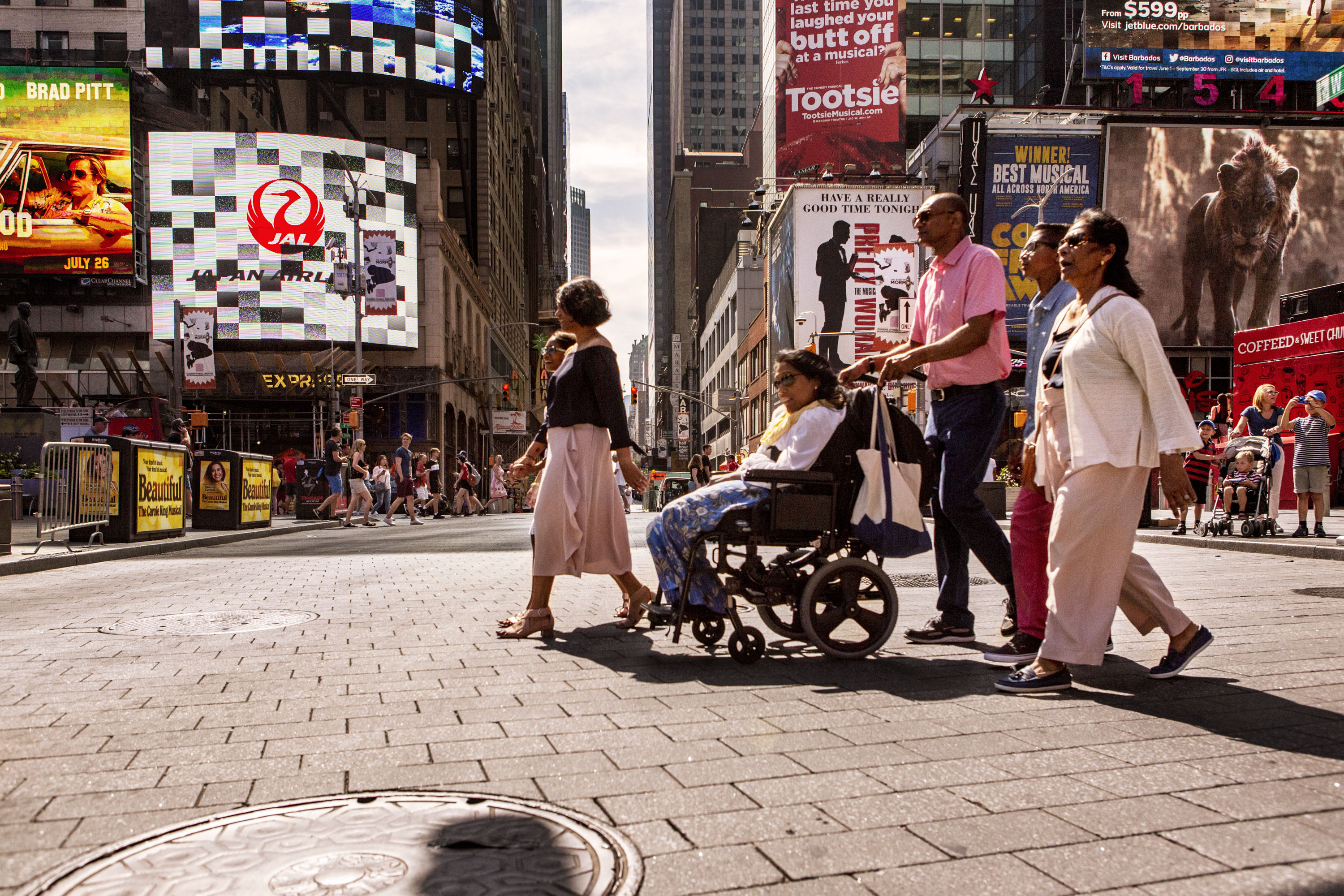 Lakshmee Lachhman-Persad and her sister Annie explore Times Square with their family.