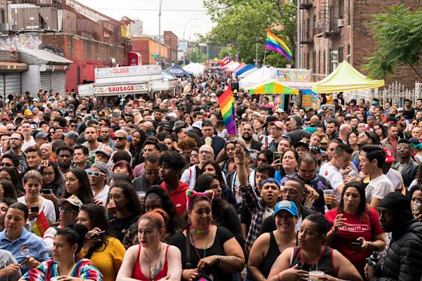 Queens Pride parade march down 37th Avenue