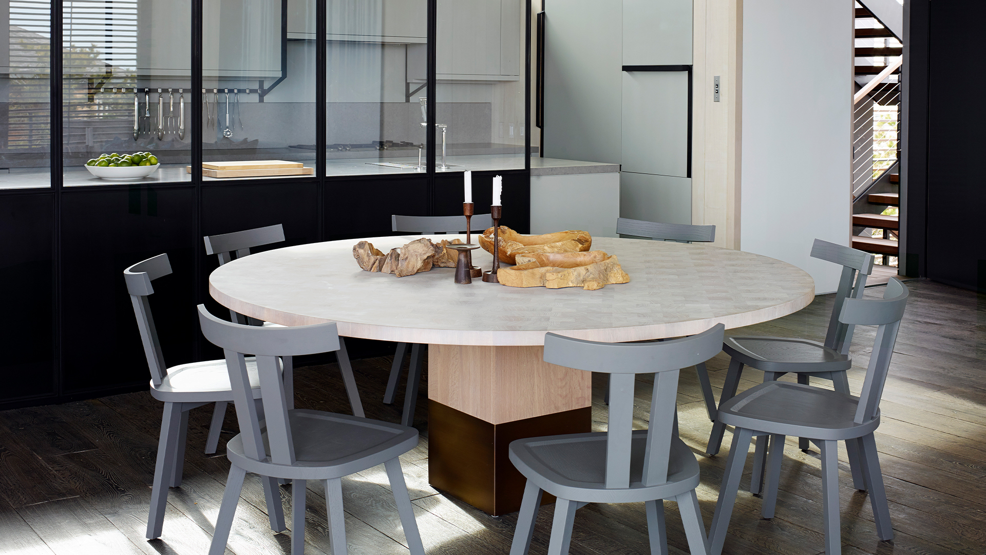 Nota Bene dining table by Van Rossum, custom dining chairs by Etel