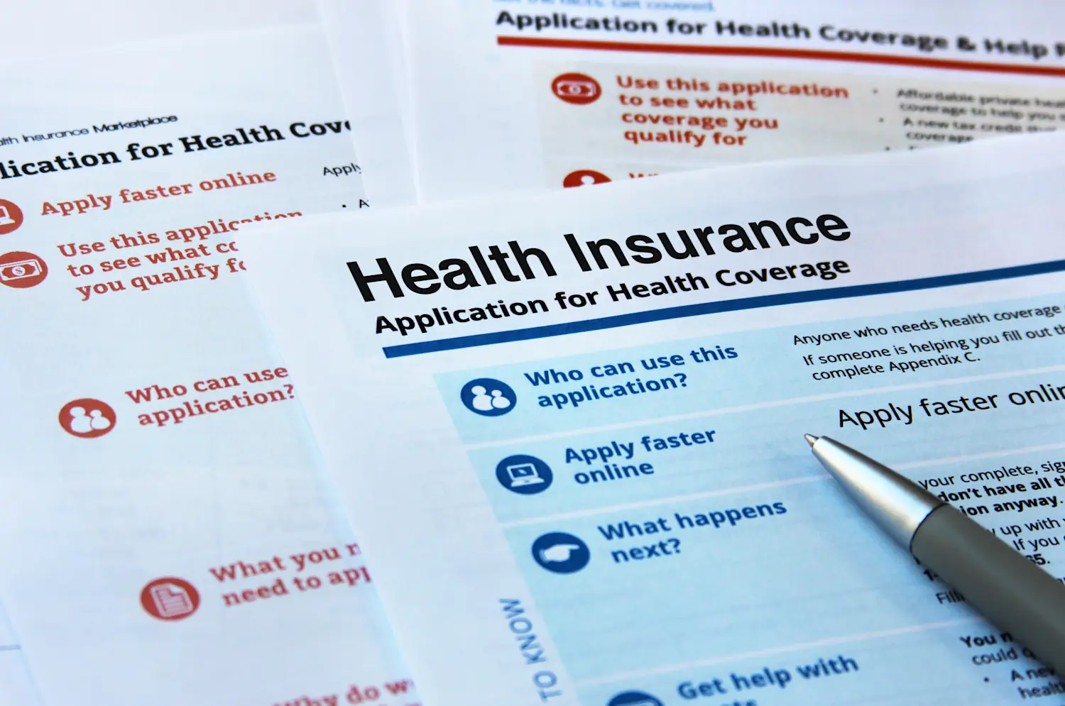 Paperwork and applications for health insurance coverage