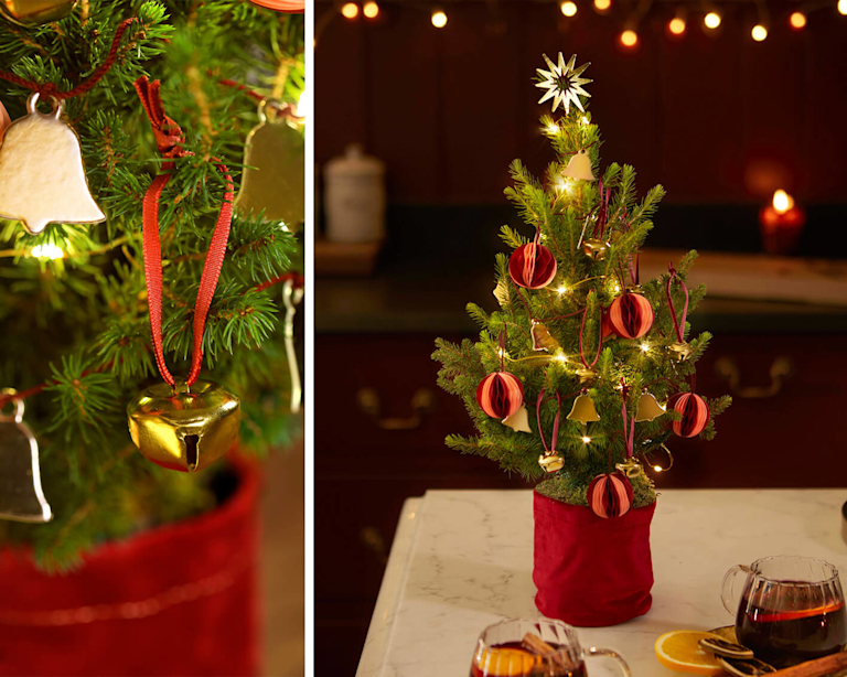 A collage of a mini Christmas tree, decorated with gold bells and red baubles. 