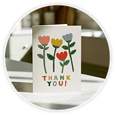 A greetings card with a 'thank you' message