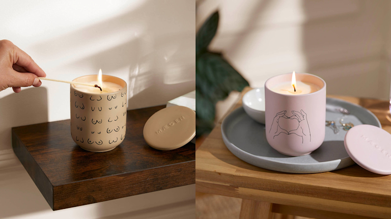 On the left side of the image, a hand lights a candle. The candle's casing is tan, with fine-line illustrations of breasts around it. On the right side sits a lit, light pink candle with an illustration of hands forming a heart. 