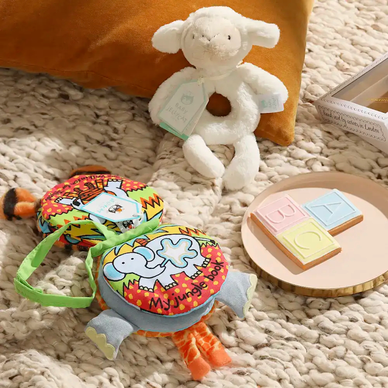 After bathtime comes bedtime. And this set is designed to help everyone settle down. The ‘Jungle Book’ and super-soft lamb rattle are both made by our friends at Jellycat, and the ABC biscuit is hand-iced by Biscuiteers.  