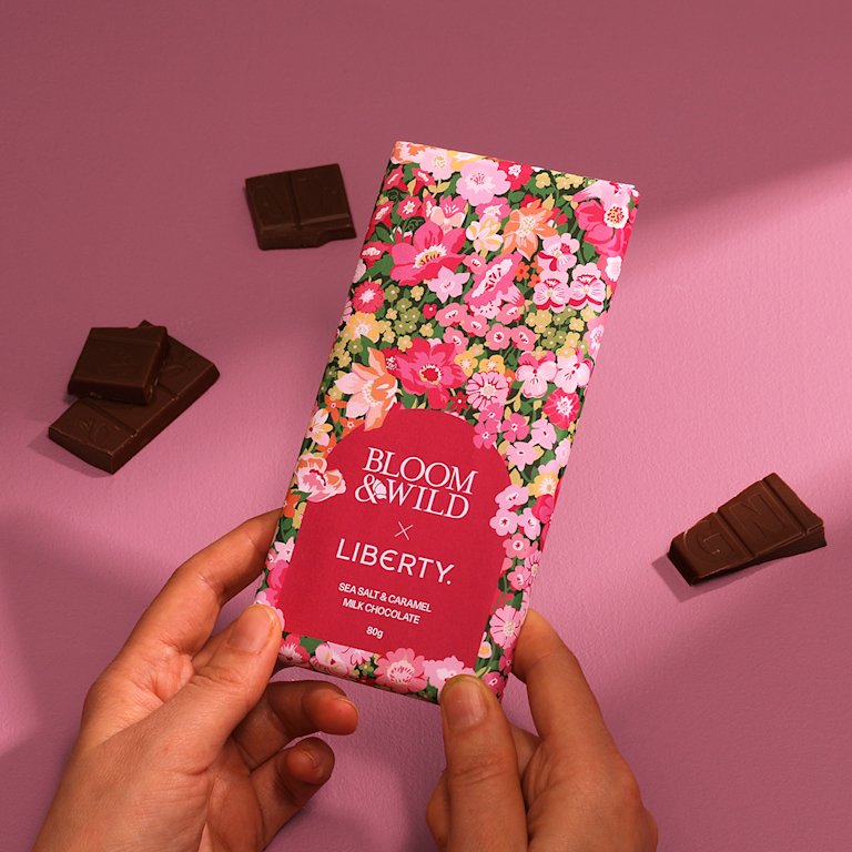 A sea salt and caramel chocolate bar, wrapped in a Liberty print.