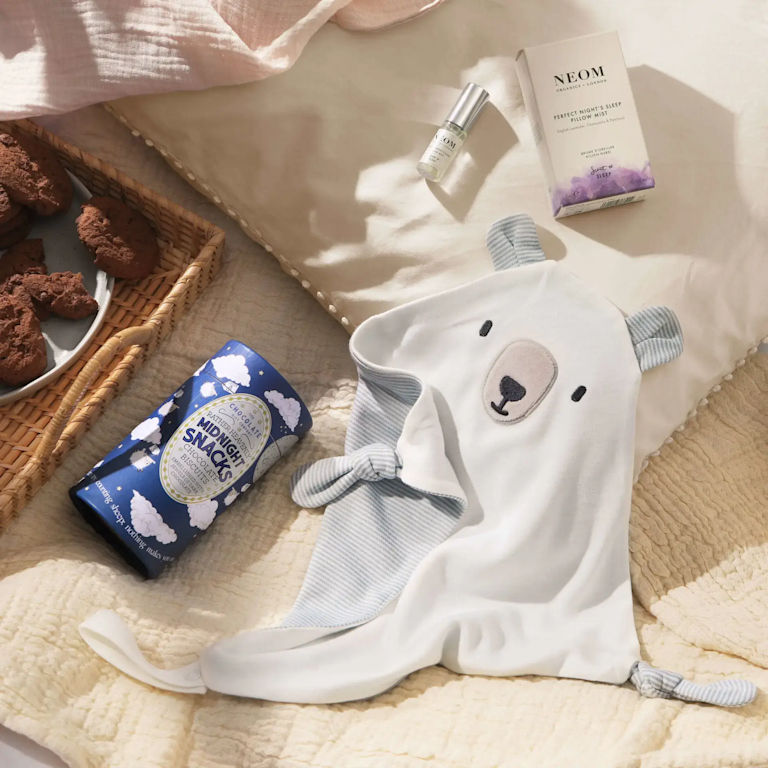 Make bedtime blissful for little ones and parents with this delightful gift set. Featuring a Jellycat comforter, NEOM's pillow mist, and The Chocolate Gift Co's 'Midnight Snacks' chocolate biscuits.