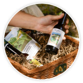 A Bloom & Wild gift hamper featuring a nuts, crackers and bottles of craft beer.