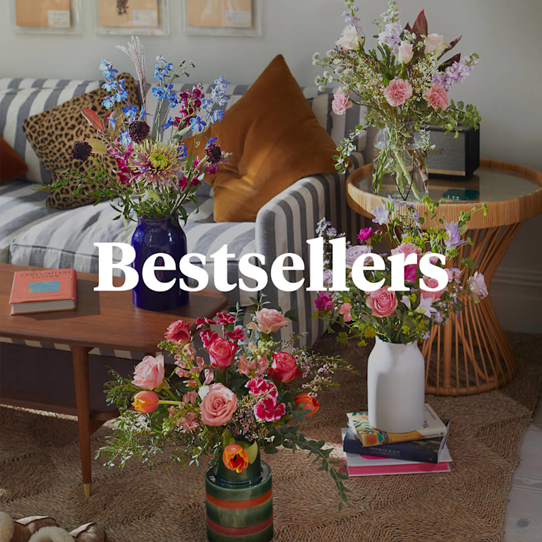 A living room, dotted with bouquets in varying shades. Before them is the word 'Bestsellers'.
