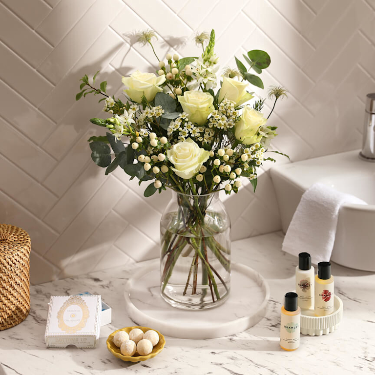 Their bodies (and minds) are going to need some love a few weeks in. This set comes with Bo, our bunch of soft, calming stems. Delicious white chocolate truffles for savouring. And a bath and body set to relax that tired bod. 
