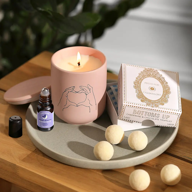 Give them an excuse to switch off for a minute or two with this soothing trio. They’ll find a relaxing pulse point roller, scented candle and champagne truffles.  For each one we send, we’ll donate £1 to Carers Trust.