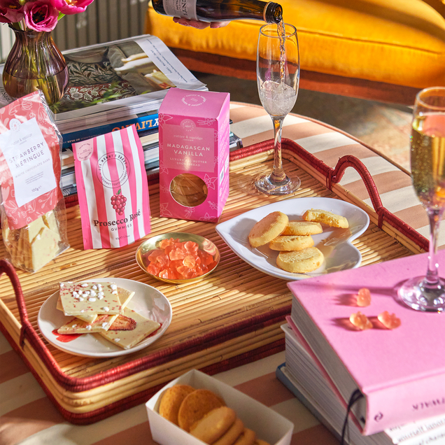 Bloom & Wild x Liberty flowers on a table. 