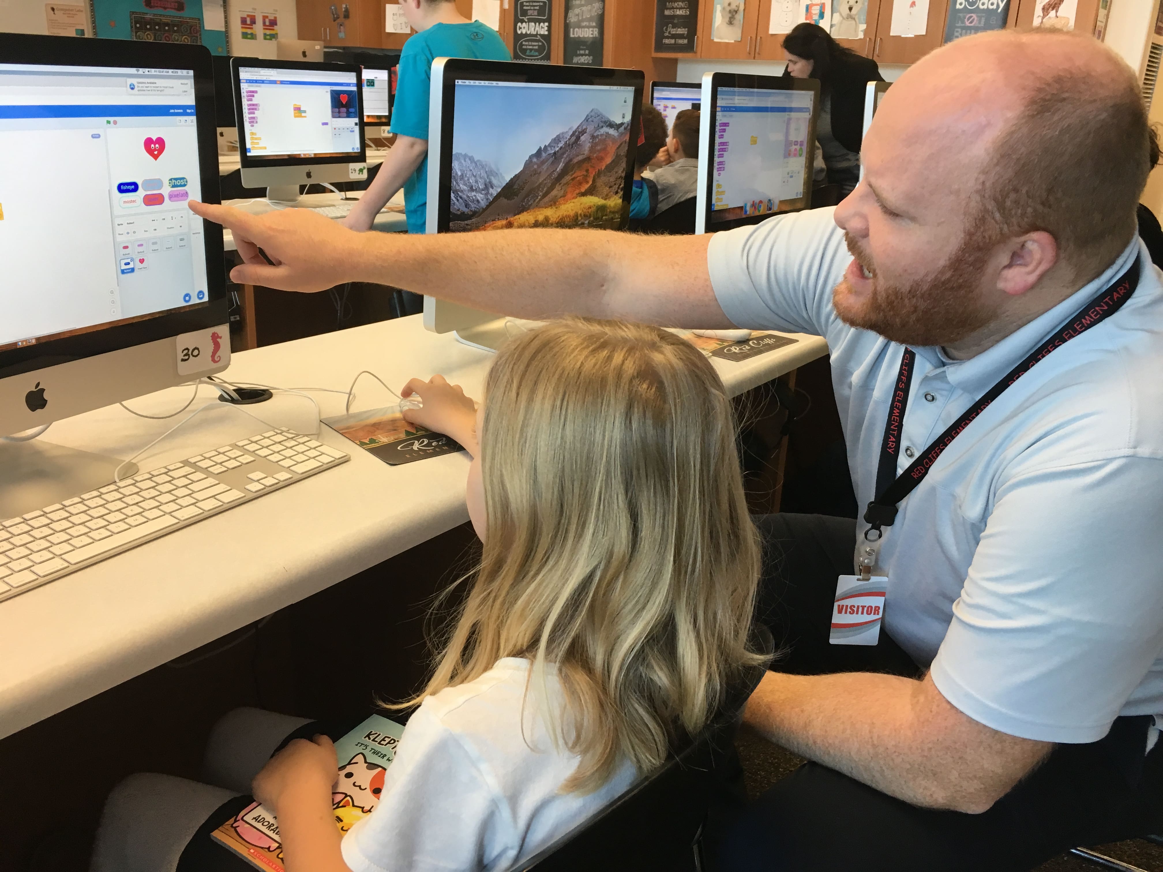 mckay and student on a computer