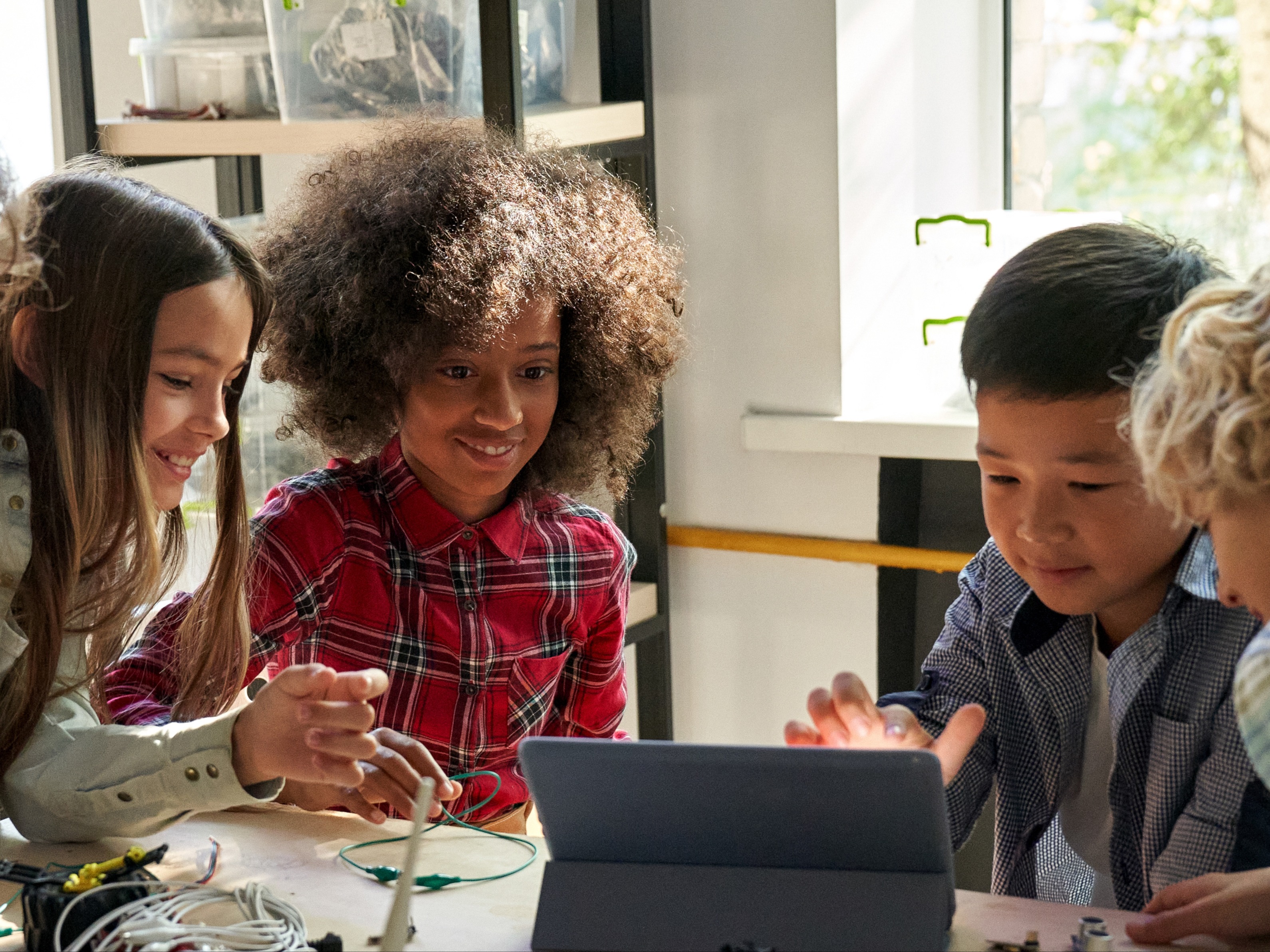 group of students tablet