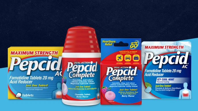 A collection of Pepcid AC Maximum Strength & Pepcid Complete products lined up in a row