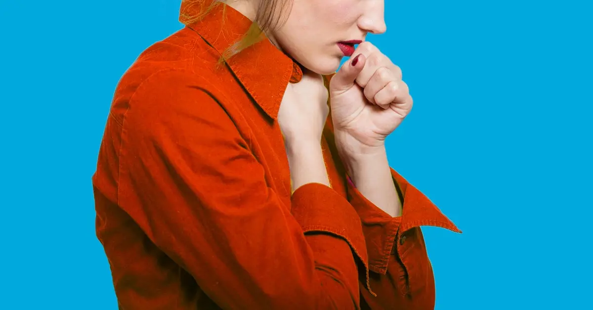 Woman with heartburn coughing