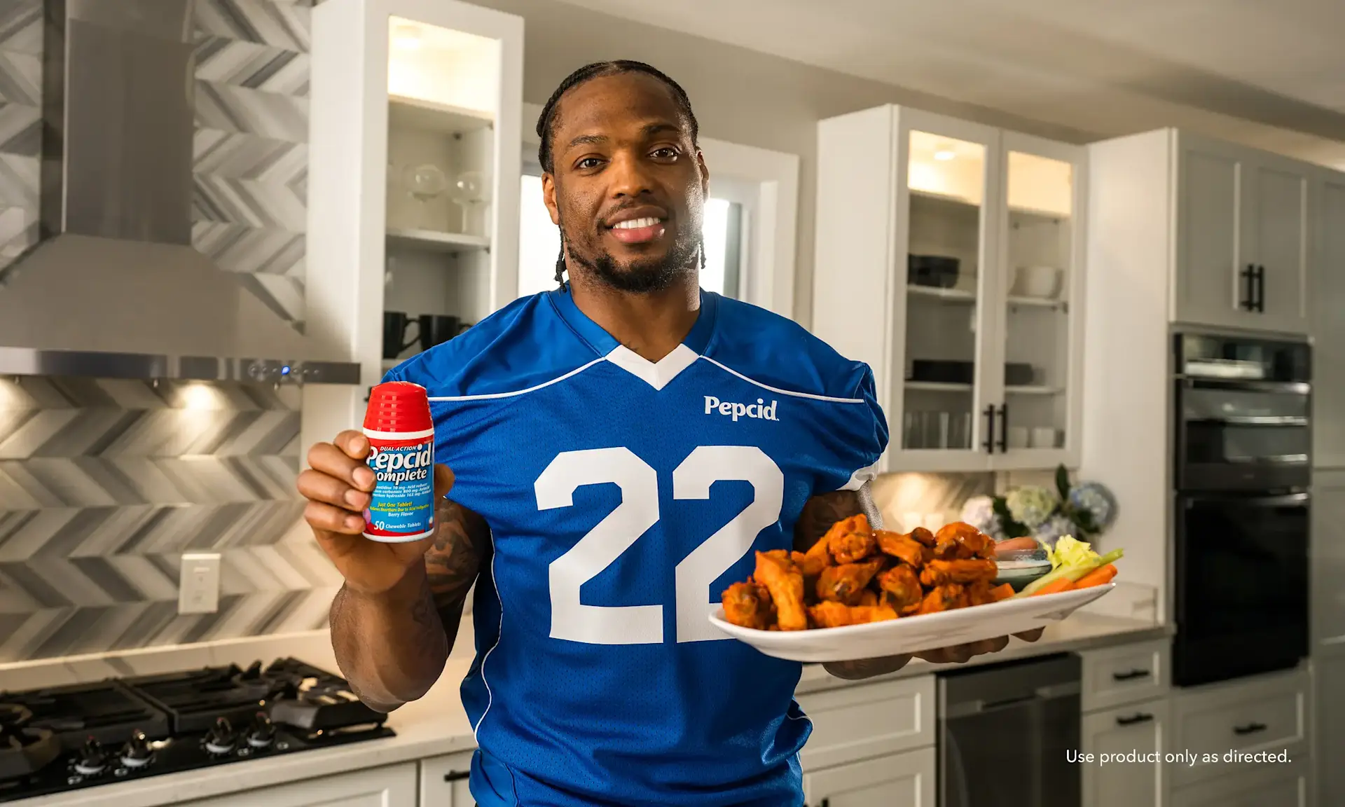 Enjoying wings with PEPCID COMPLETE® for game day relief!