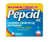 A box of Maximum Strength Pepcid AC® tablets with Famotidine for acid indigestion relief.