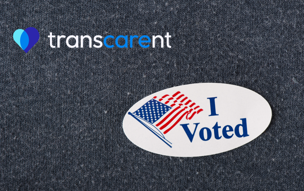 TC blue heart RGB logo on shirt with I voted button.