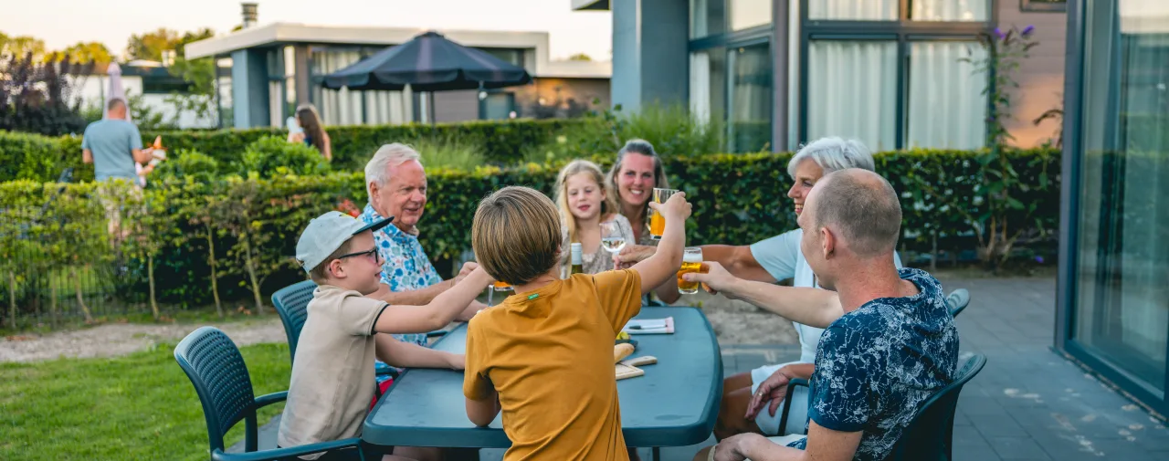 family terrace garden summer evening toasting