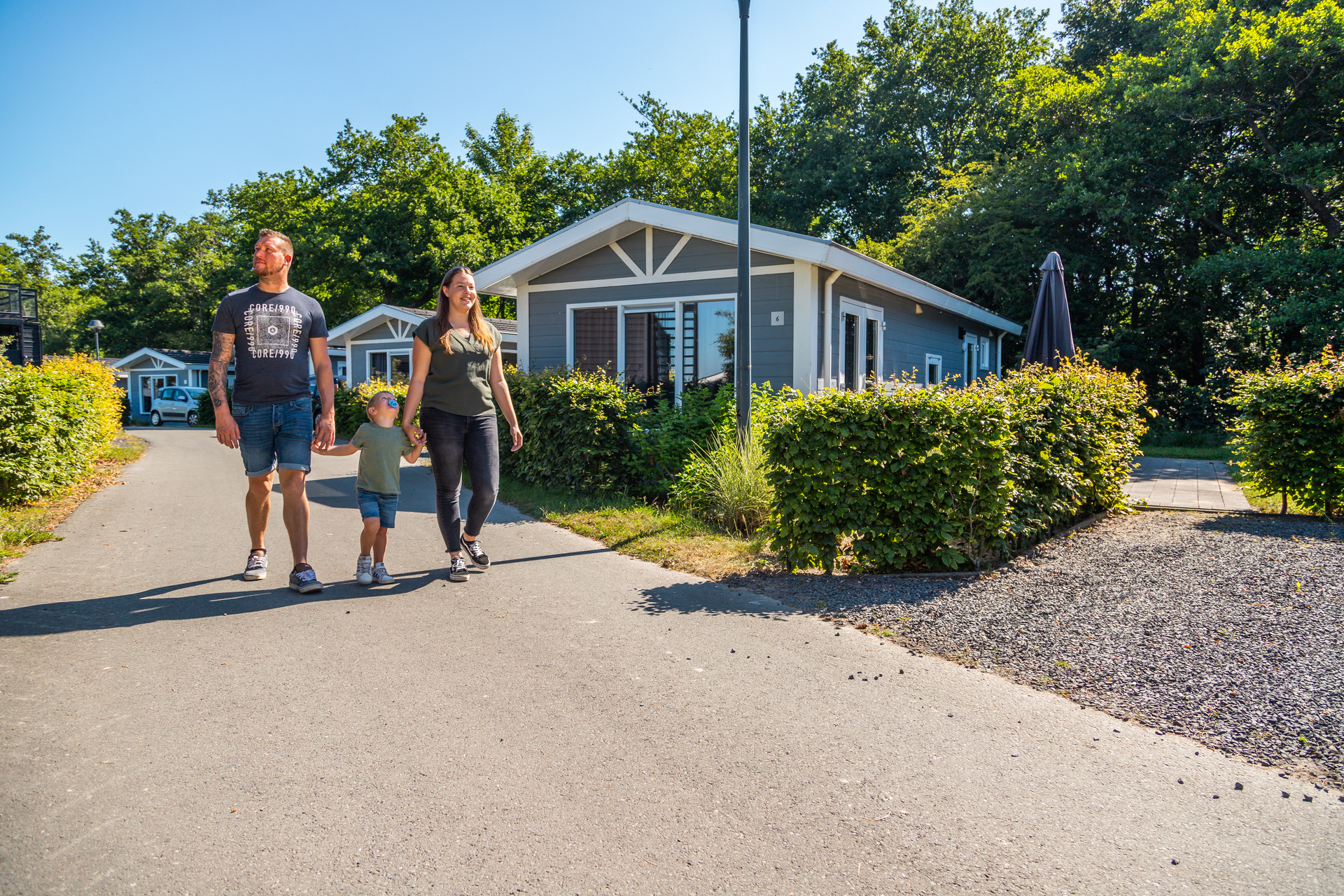 Bad Hoophuizen - Family Walking at the park