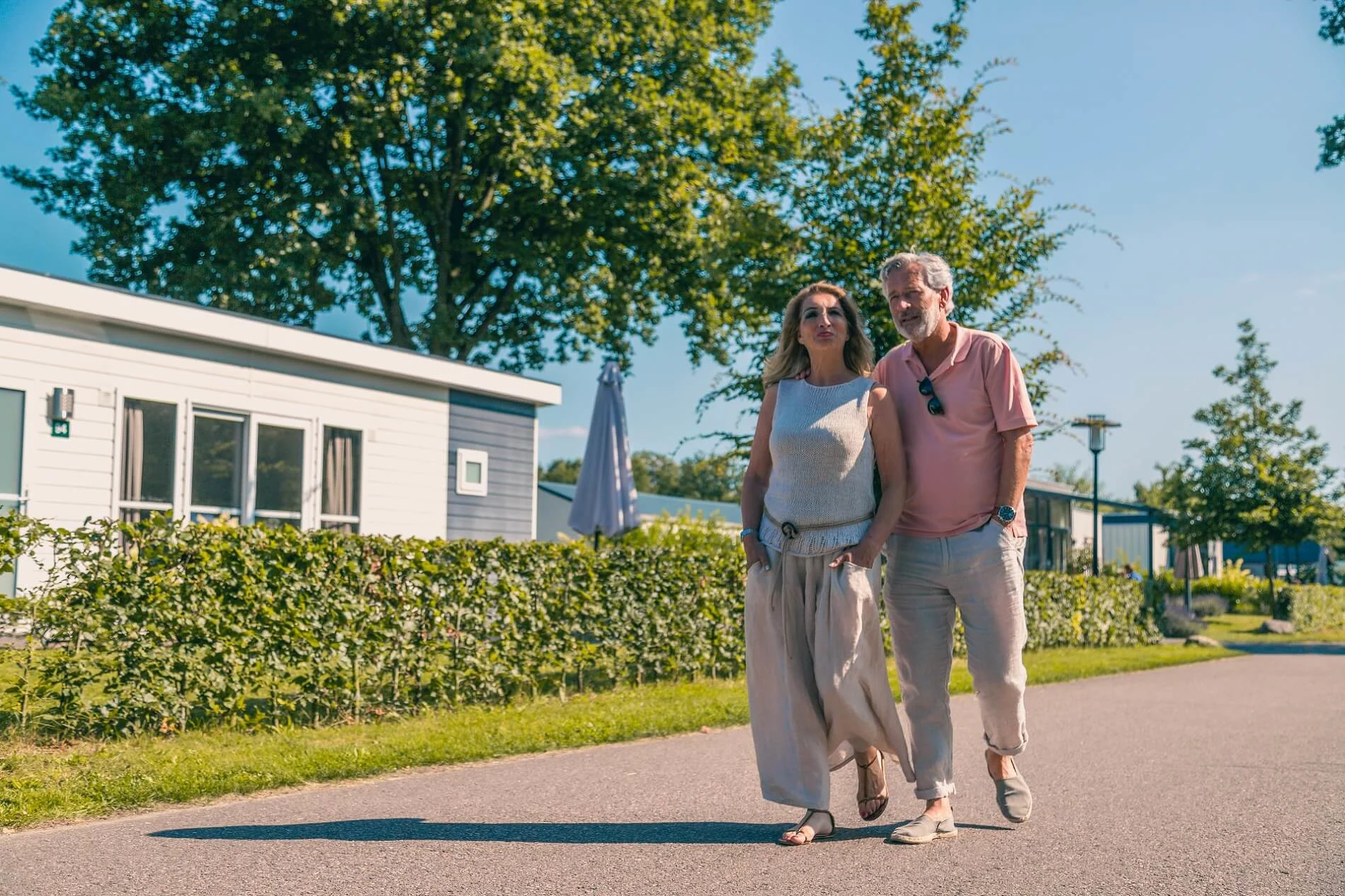 EuroParcs Reestervallei couple walking through holiday park