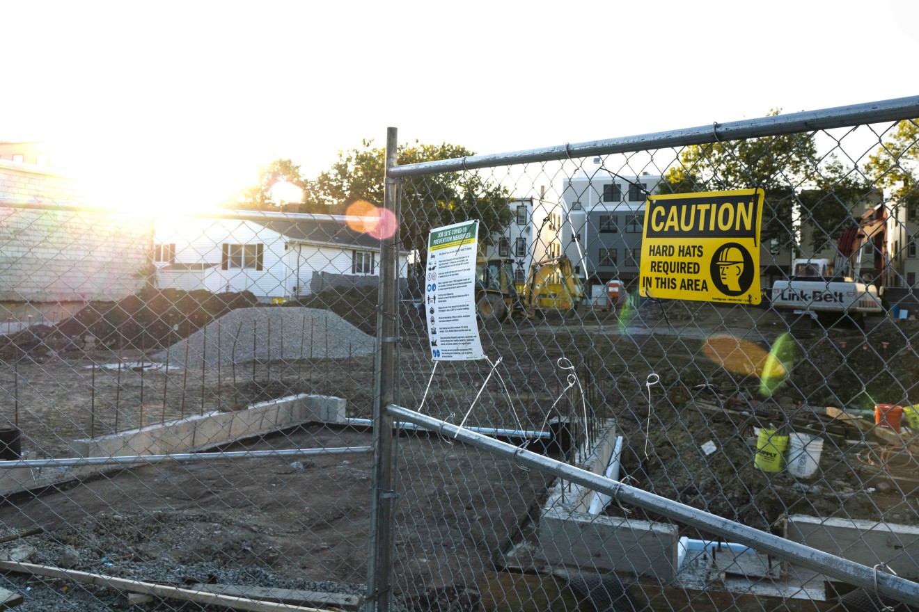 Construction next to a residential neighborhood of Eastie.