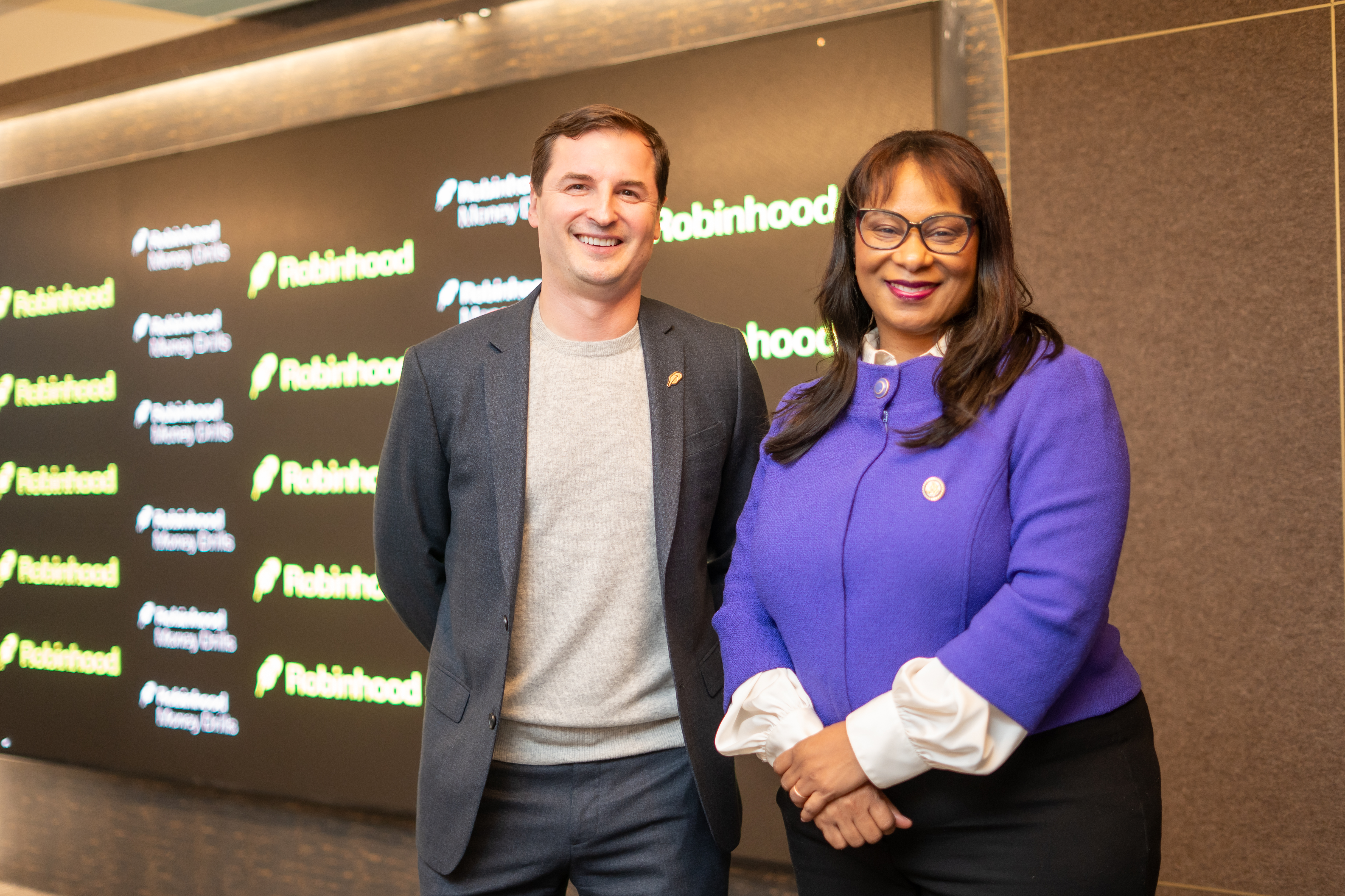 Robinhood's General Counsel Lucas Moskowitz and Congresswoman Janelle Bynum at a D.C. event on Money Drills