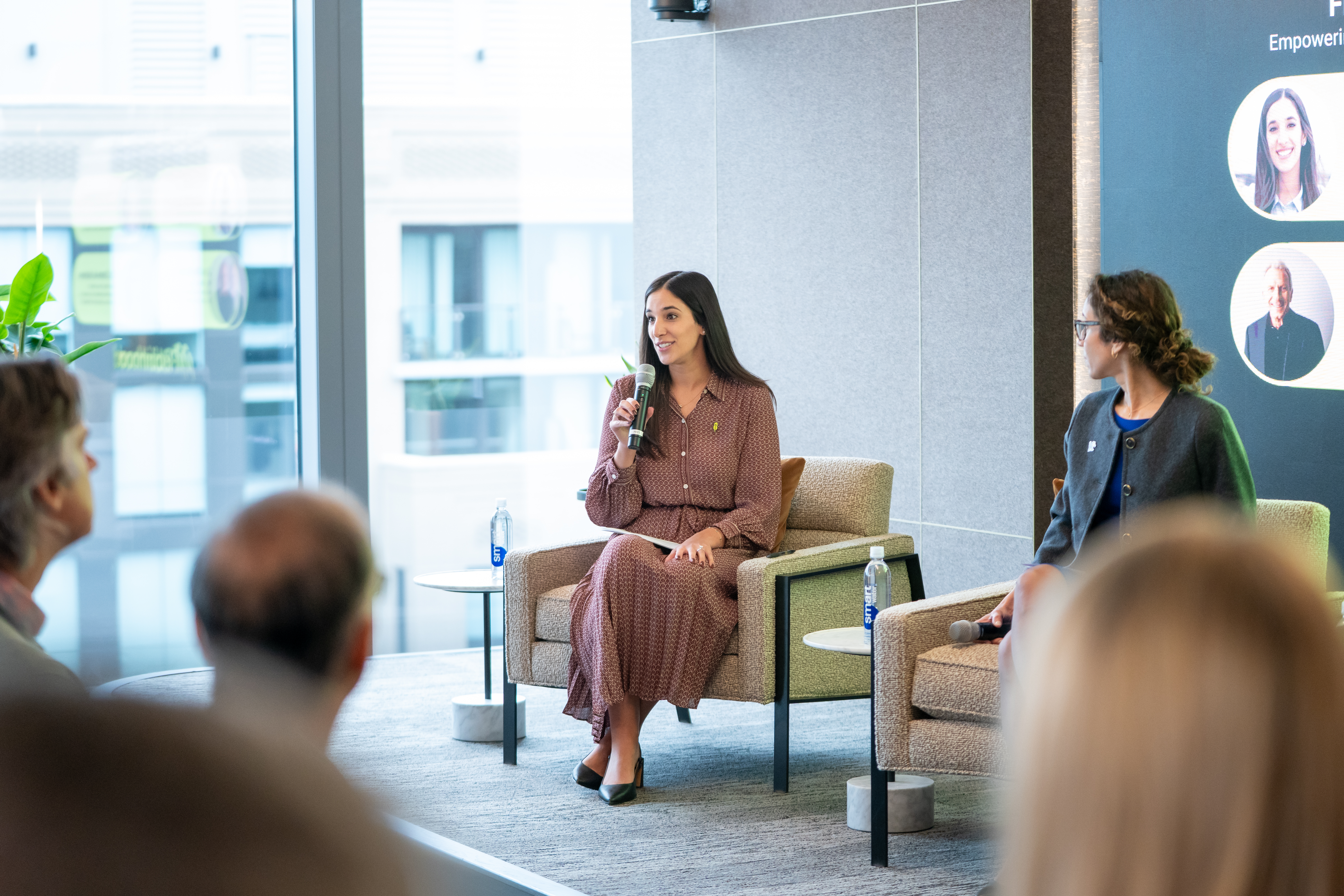 Robinhood's Senior Director of International Government and External Affairs Chloe Barz moderates financial education panel with professors and professional athletes