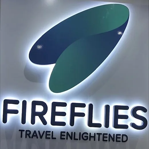 Fireflies Travel Reception Sign — signage by Best Color Signs, Dubai