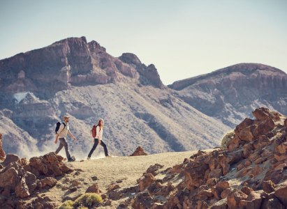 Backpackers with fully equipped rucksack