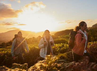 Hiking in the beaming sun wearing sun protection clothes