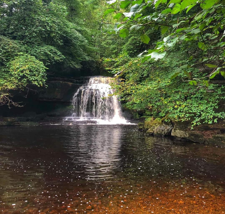 Wild swimming in West Burton Falls