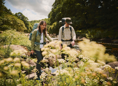 The Ecologists walking by the river