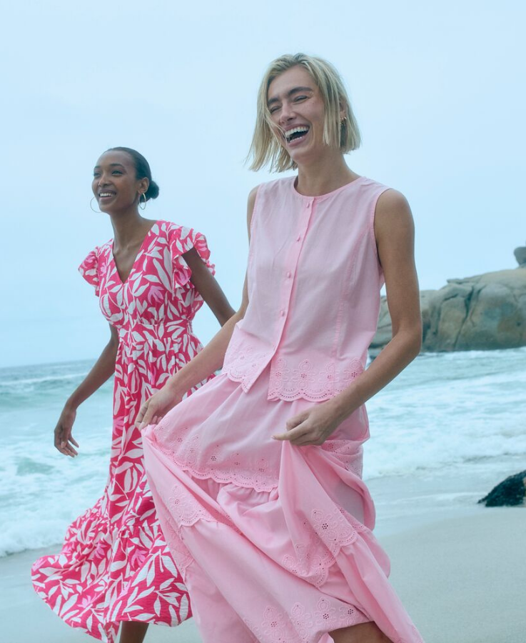 Two ladies wearing a Regatta Life pink dress and pink co-ord set