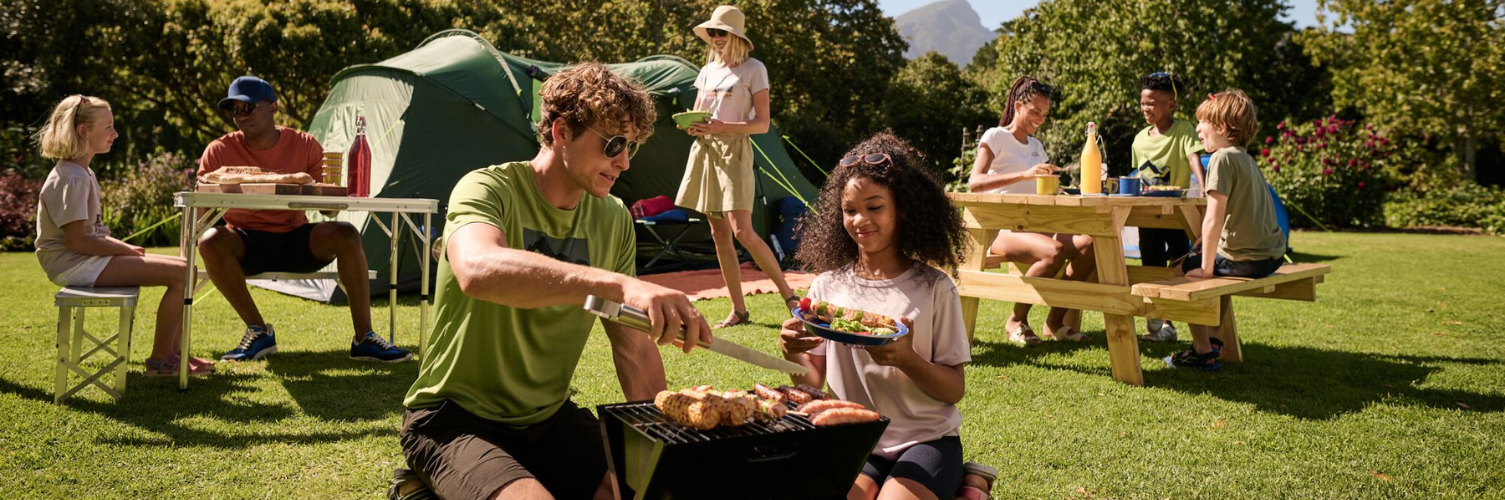 a family camping and cooking