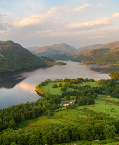 Aerial view of a Summer afternoon at Ullswater seen from Gowbarrow Fell in The Lake District, UK.