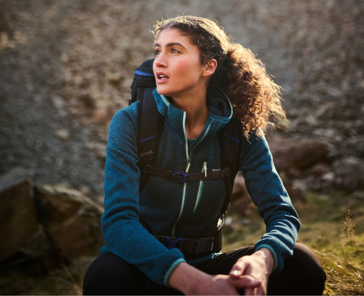 A woman dressed in Regatta hiking gear on a hike.