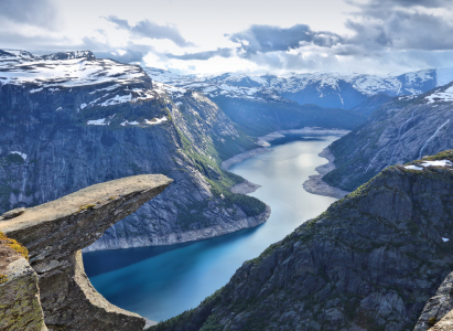 A deep view over Trolltunga to the Fjords below