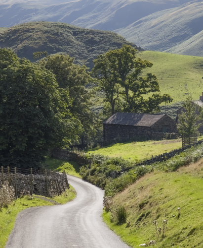 Quiet lane near St Peter's Church, the Lake District, Cumbria, England.