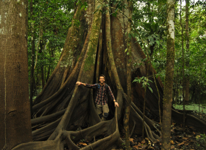 Dael Sassoon stood near the roots of a great tree