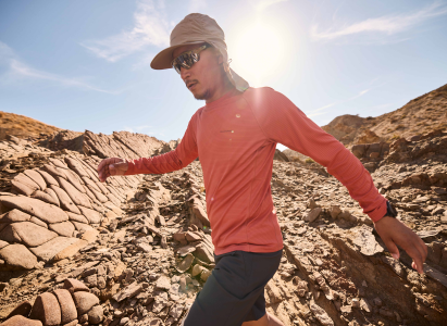 Walking in the sun wearing a SolarShield+ shirt