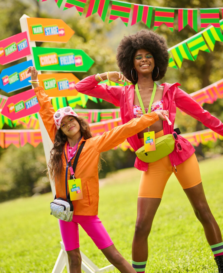 A woman and a girl wearing Regatta outdoor clothing at a music festival