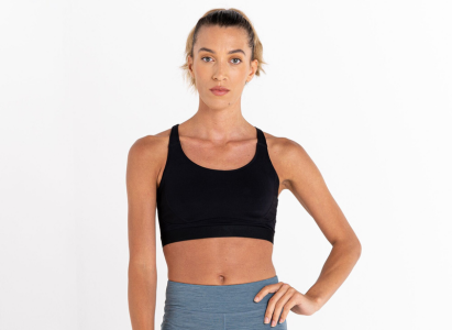 Woman wearing a black dare 2b sports bra