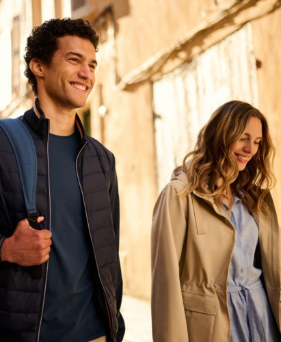 Man and a woman wearing Regatta holiday clothing exploring on a city break
