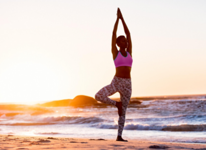 Image of woman doing tree pose