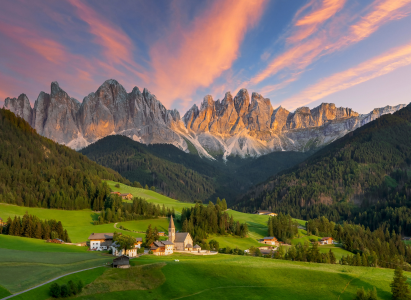 The sunset reflecting off the Dolomites