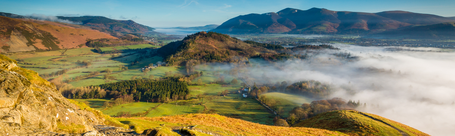 Views to Keswick, Skiddaw and Bassenthwaite Lake are seen straight over from Catbells, The Lake District, Cumbria, England
