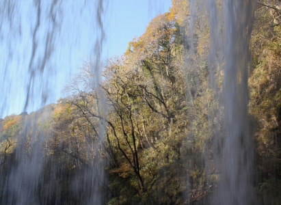 Behind the waterfall