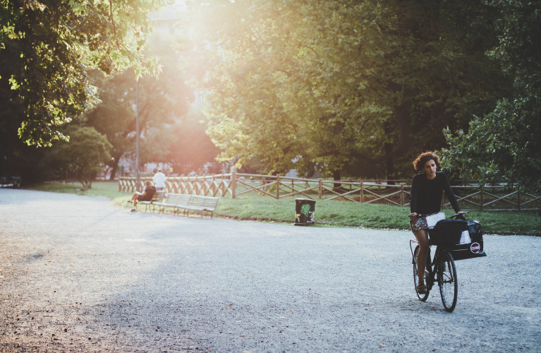 Benefits of the Outdoors - Cyclist in Park