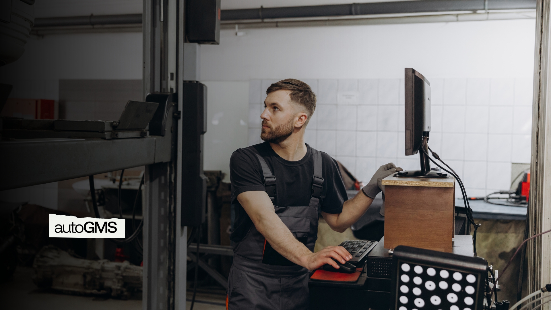 technician performing adas calibration with scan tool in auto repair shop